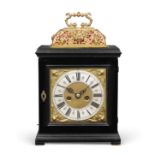 A good early 18th century ebonised basket top table clock Jonathan Lowndes, Pall Mall, London