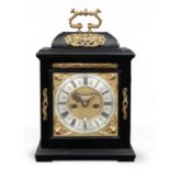 An early 18th century ebonised table clock with trip repeat and internal rack striking Jonathan L...