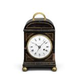 A very rare second quarter of the 19th century boxwood-strung ebonised travel timepiece with alar...