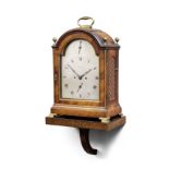A very early 19th century brass-banded mahogany single pad top bracket clock with wall bracket Ja...