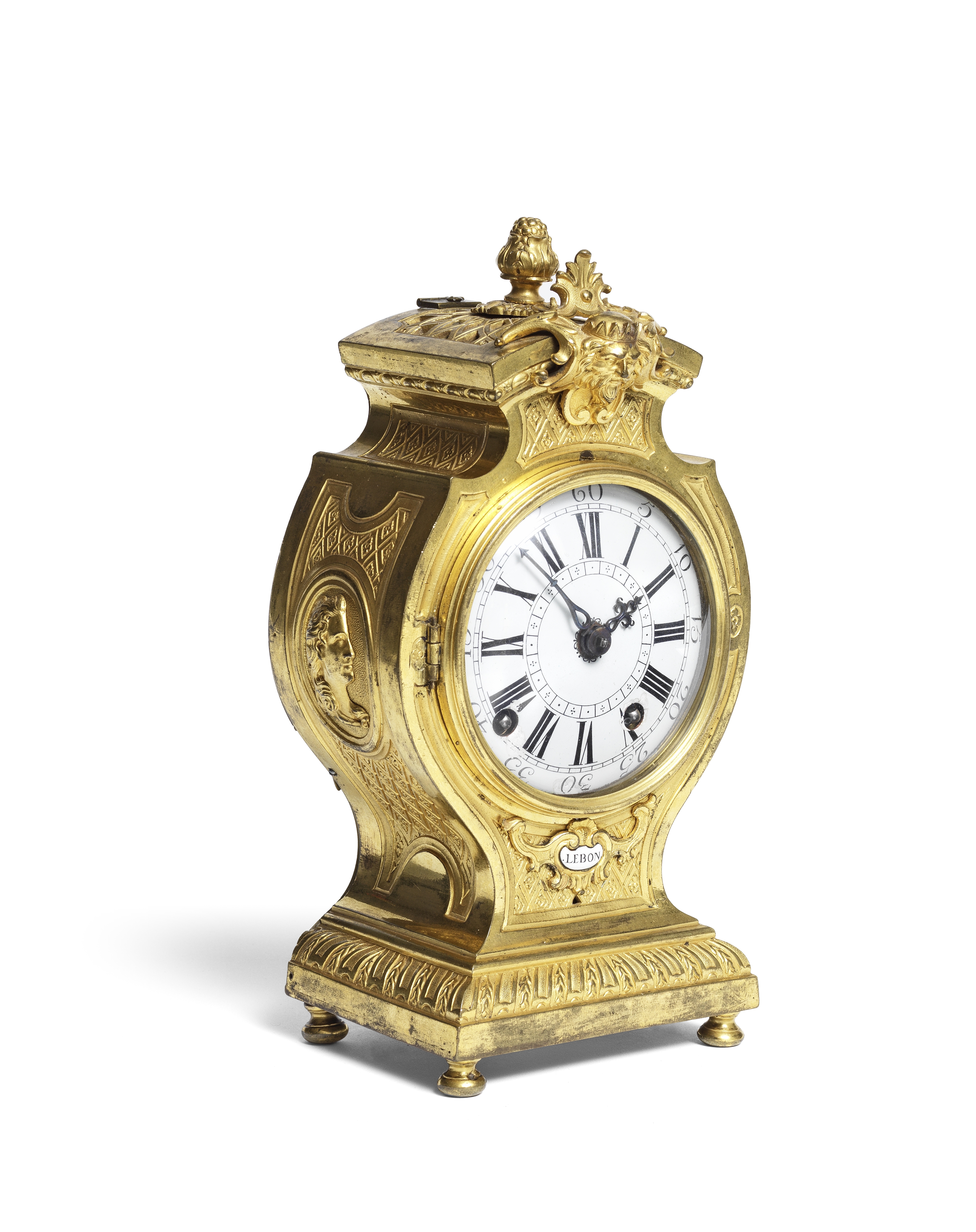 An exceptionally rare and very fine early 18th century French ormolu travelling clock with choice...