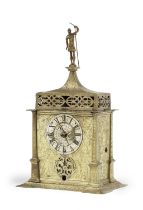 A rare early 17th century German gilt and engraved brass table clock