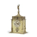 A rare early 17th century German gilt and engraved brass table clock