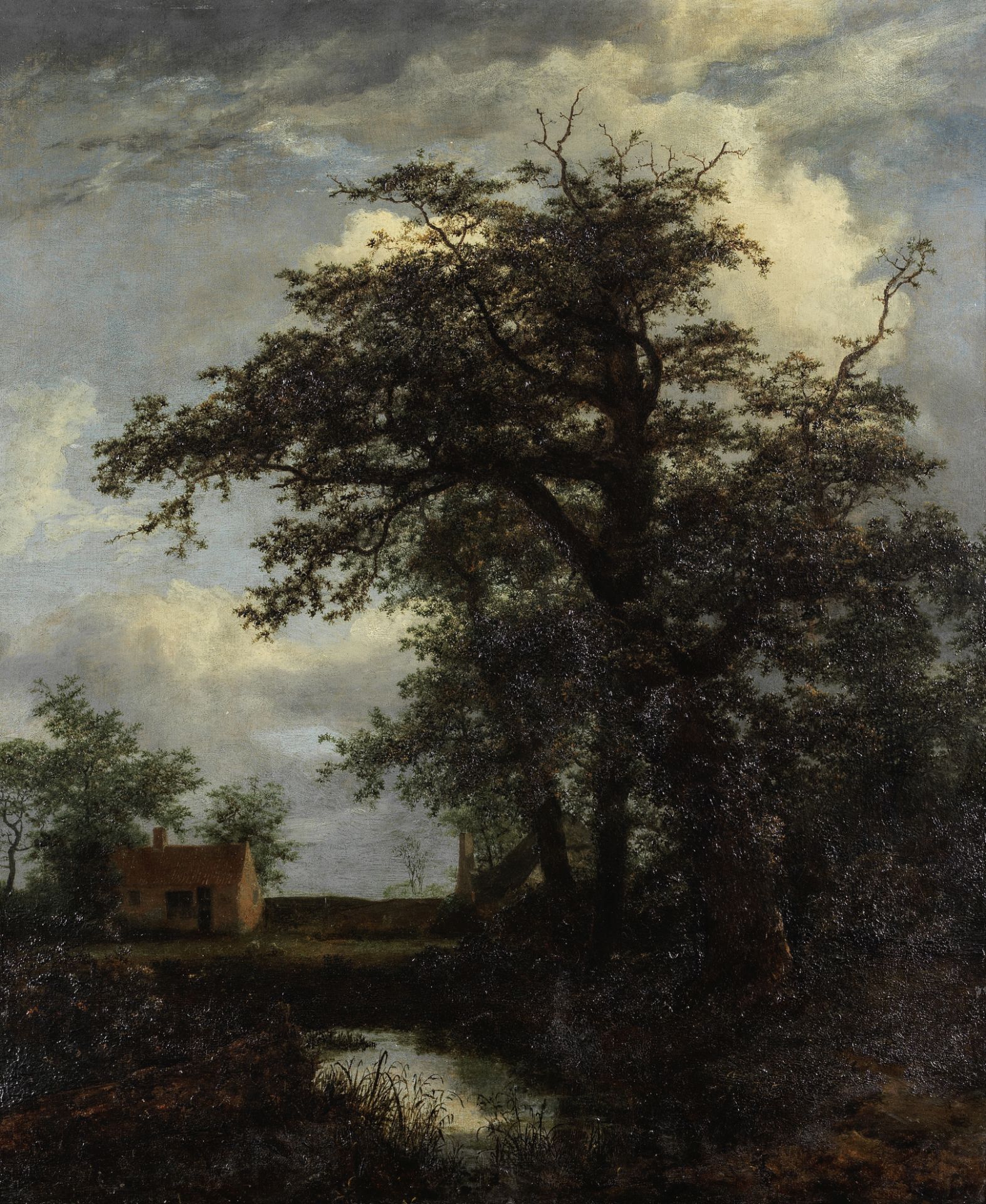 Jacob van Ruisdael (Haarlem circa 1628-1682) A wooded landscape with an oak tree, pond and houses...