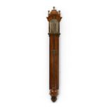 An early 18th century walnut stick barometer