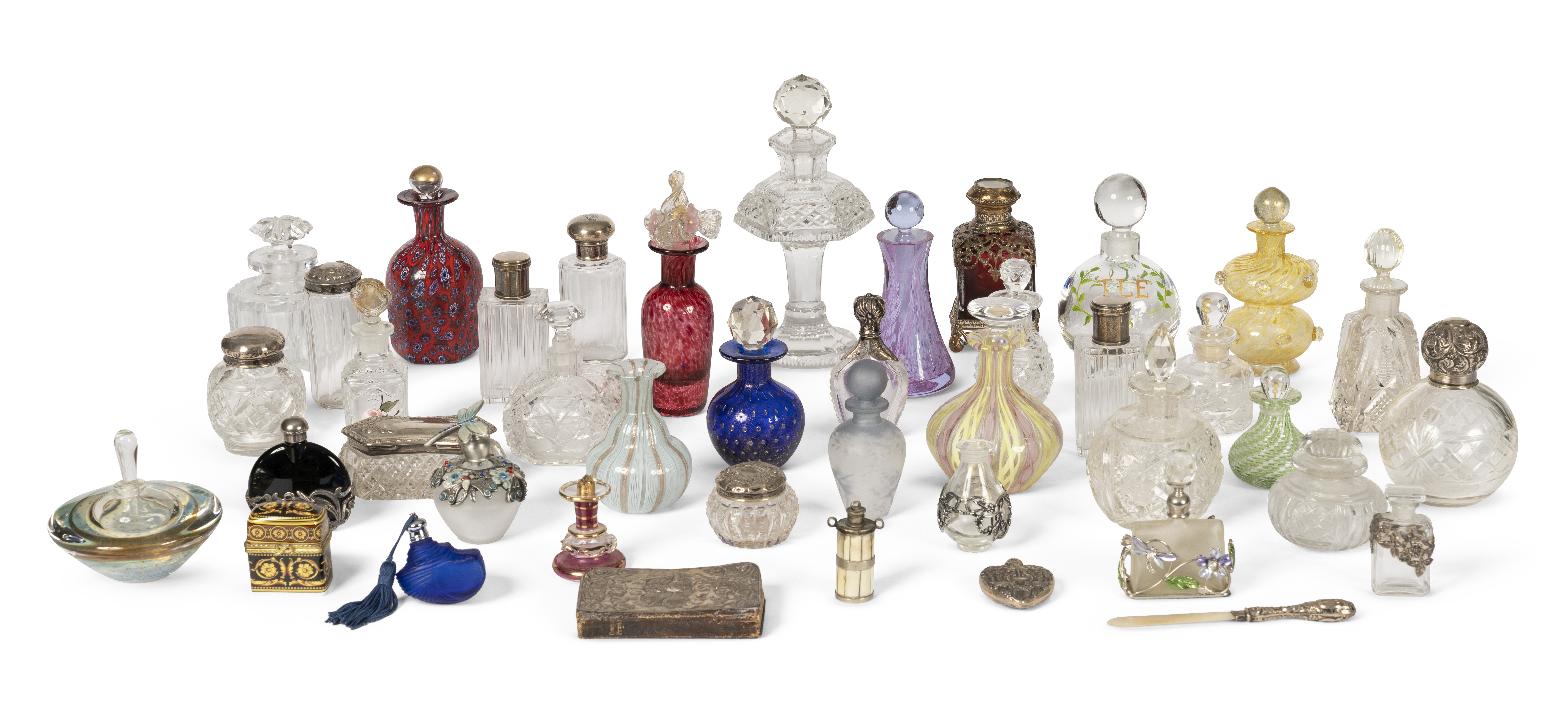 A collection of cut and moulded glass scent bottles and object d'art (qty)
