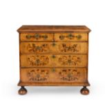 A William and Mary and later walnut and seaweed marquetry chest