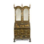 A fine and rare George I dark green and gilt japanned bureau-cabinetIn the manner of John Belchie...