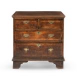 A George II oak and fruitwood crossbanded chest