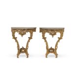 A fine pair of small Louis XV carved giltwood console tables (2)