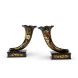 A pair of early Victorian black polychrome and gilt decorated papier m&#226;ch&#233; cornucopia (2)