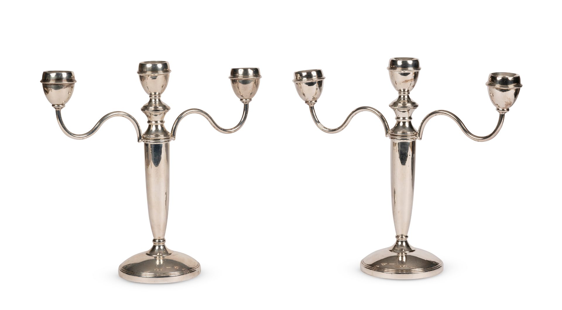 A matched pair of silver three-light candelabra Mark of J B Chatterley & Sons Ltd, Birmingham, 19...