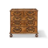 A William and Mary walnut and seaweed marquetry chest