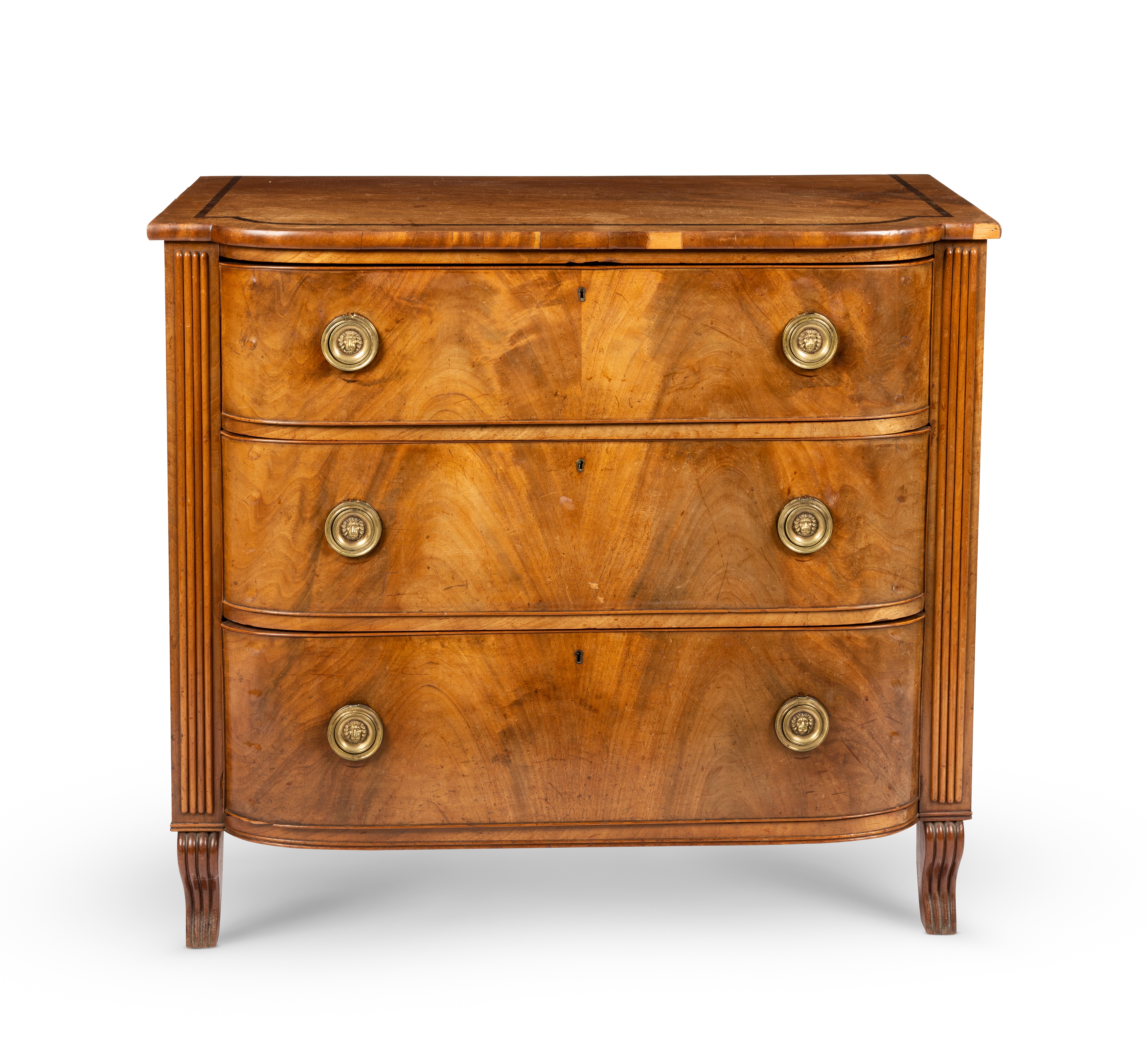 A Regency mahogany and rosewood banded bowfront chest