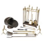 A collection of brass fire tools 19th century and later (18)