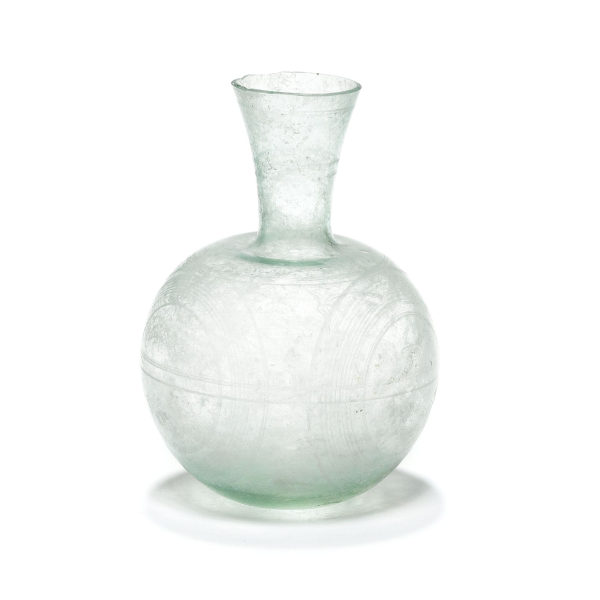 A Roman pale green glass engraved flask