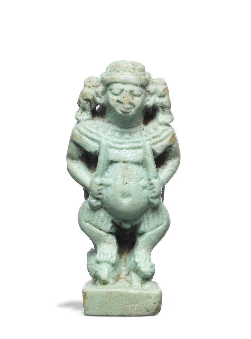 An Egyptian blue-green glazed faience amulet of Pataikos