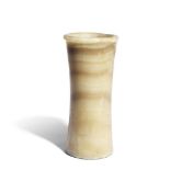 A tall Egyptian banded alabaster jar