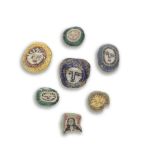A group of seven Roman glass face beads 7