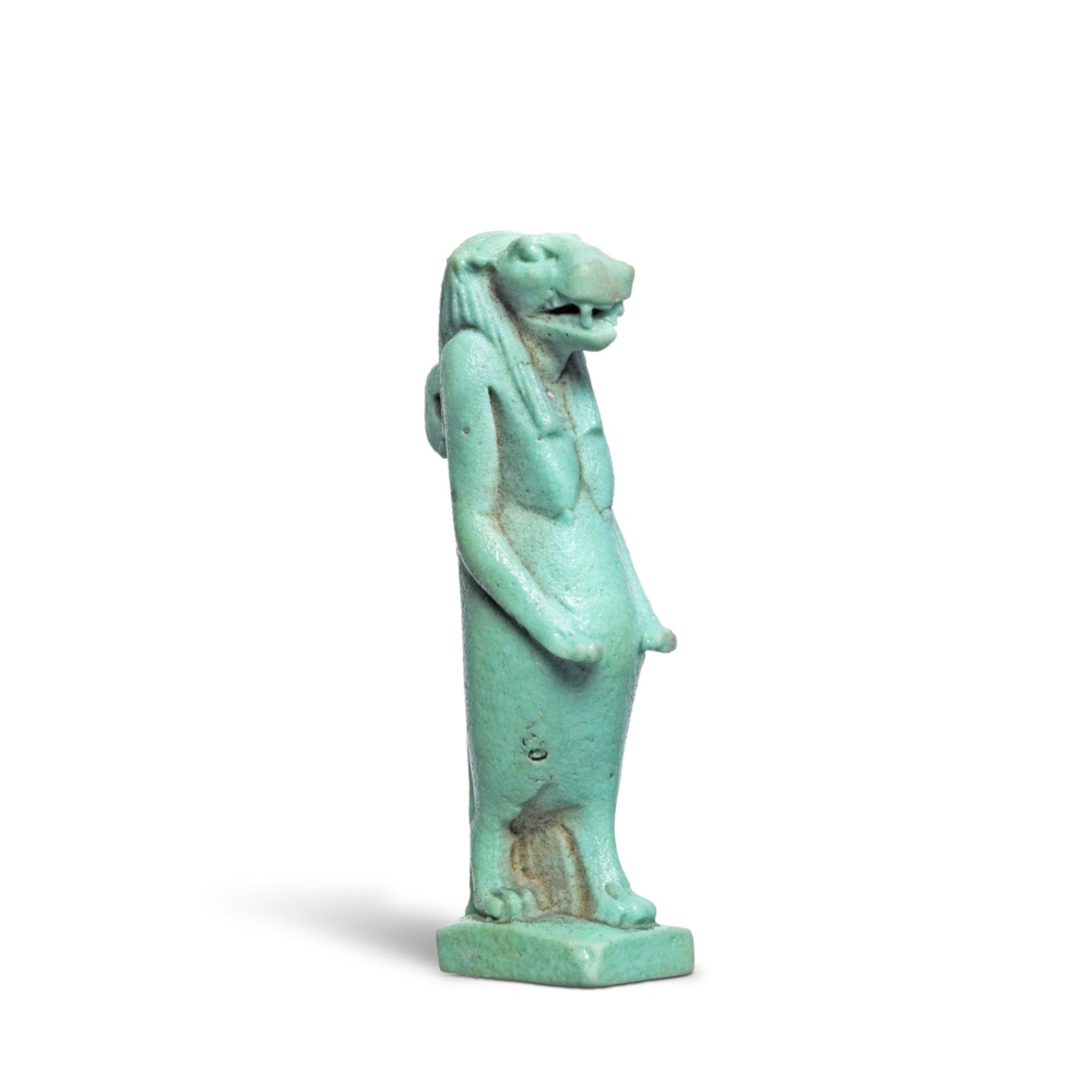 An Egyptian turquoise glazed faience amulet of Taueret