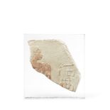 An Egyptian painted limestone relief