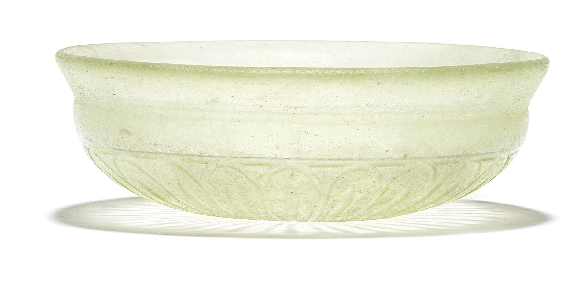 An Achaemenid colourless cast glass shallow bowl