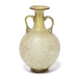 A Roman yellow-green glass amphoriskos