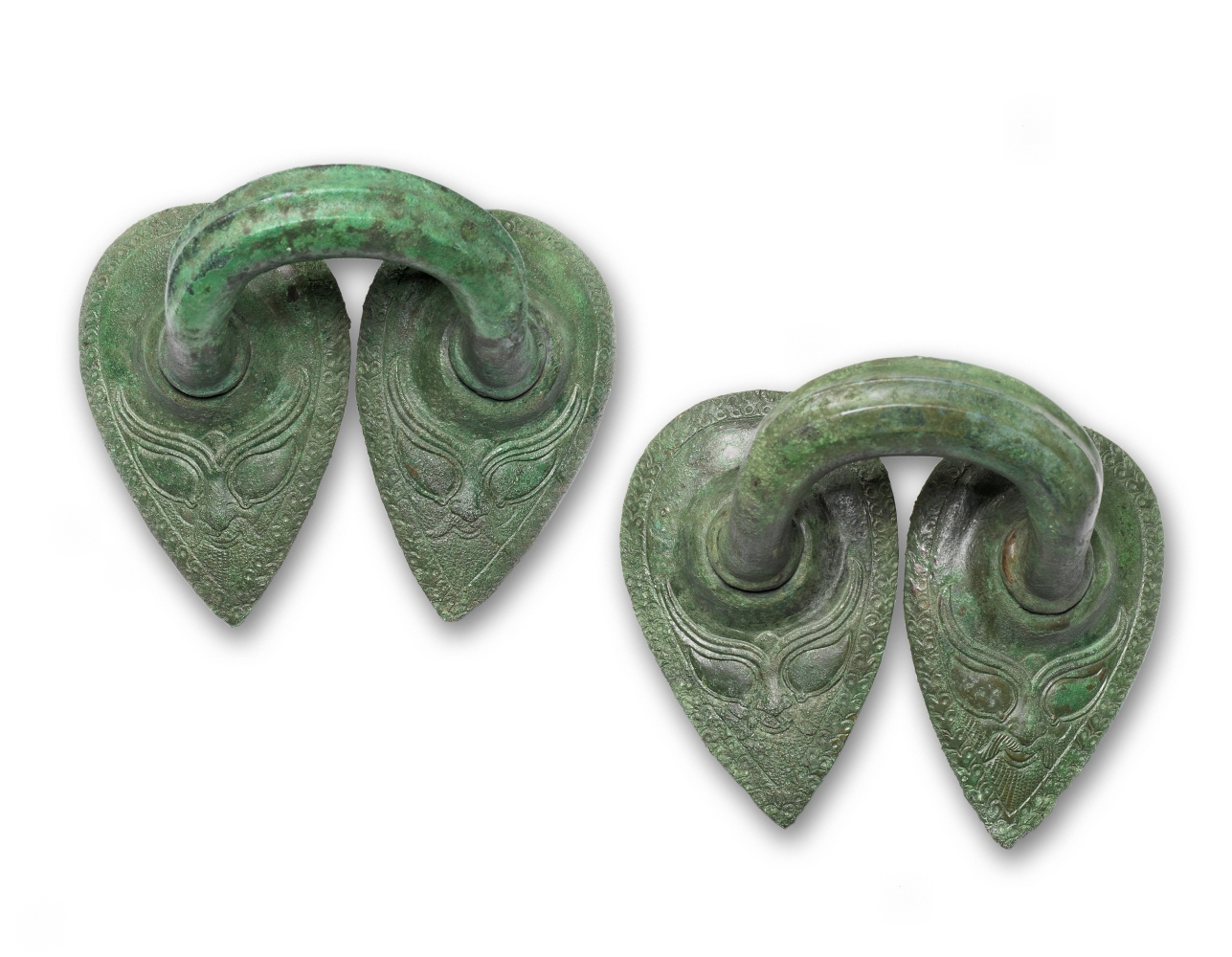 A pair of Etruscan bronze stamnos handles 2