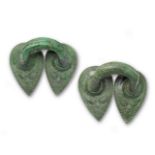 A pair of Etruscan bronze stamnos handles 2