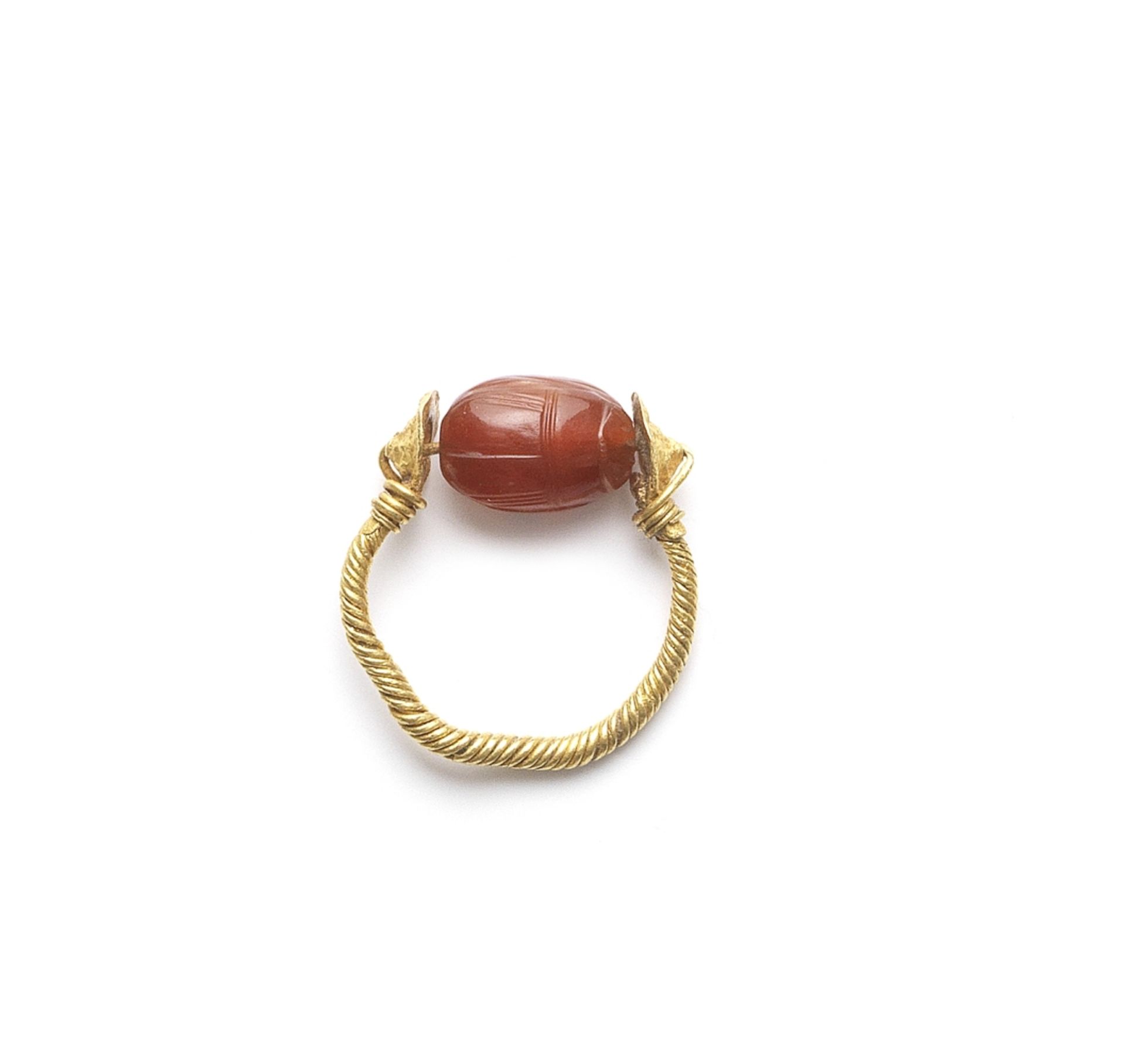 An Etruscan gold and carnelian scarab swivel ring