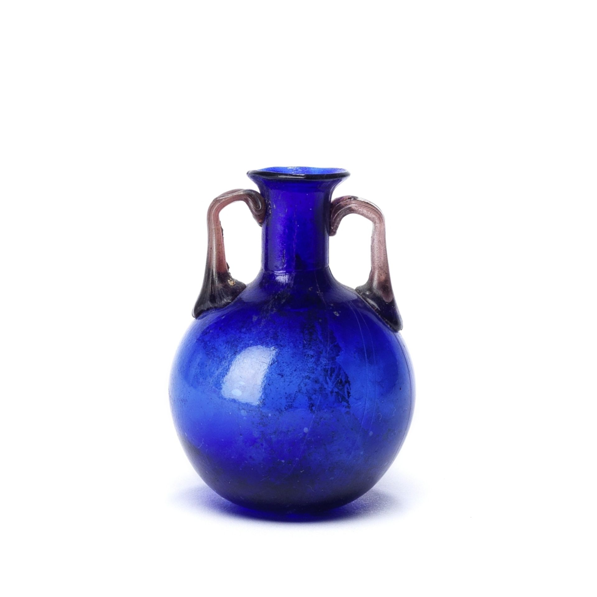 A Roman cobalt blue glass amphoriskos