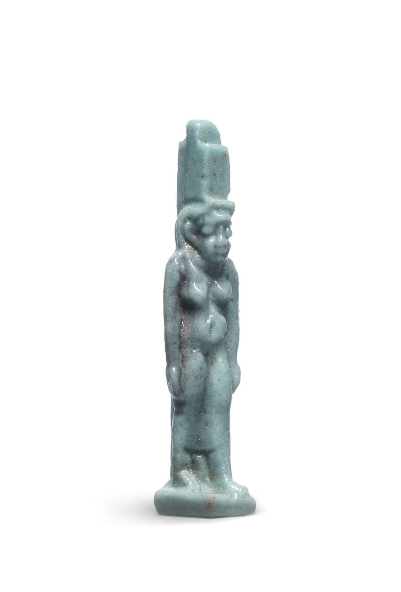 A small Egyptian blue-green faience amulet of Isis