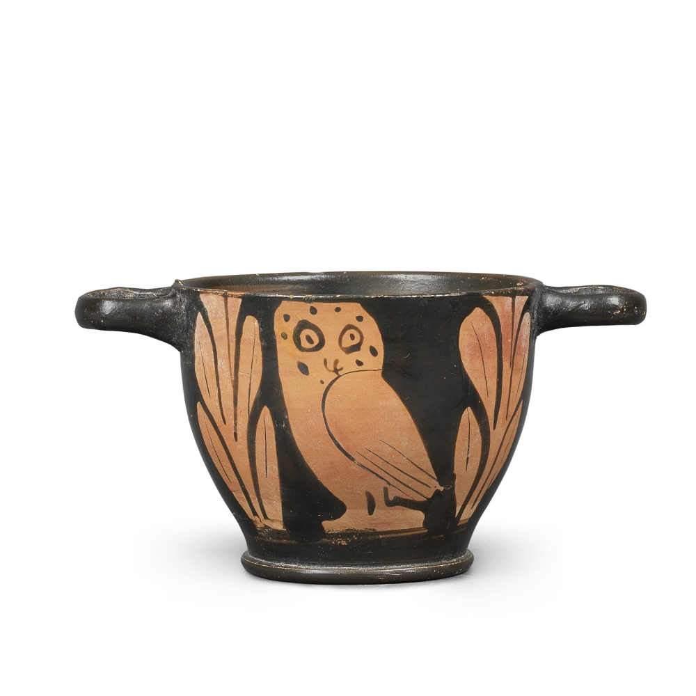 A Greek red-figure owl skyphos