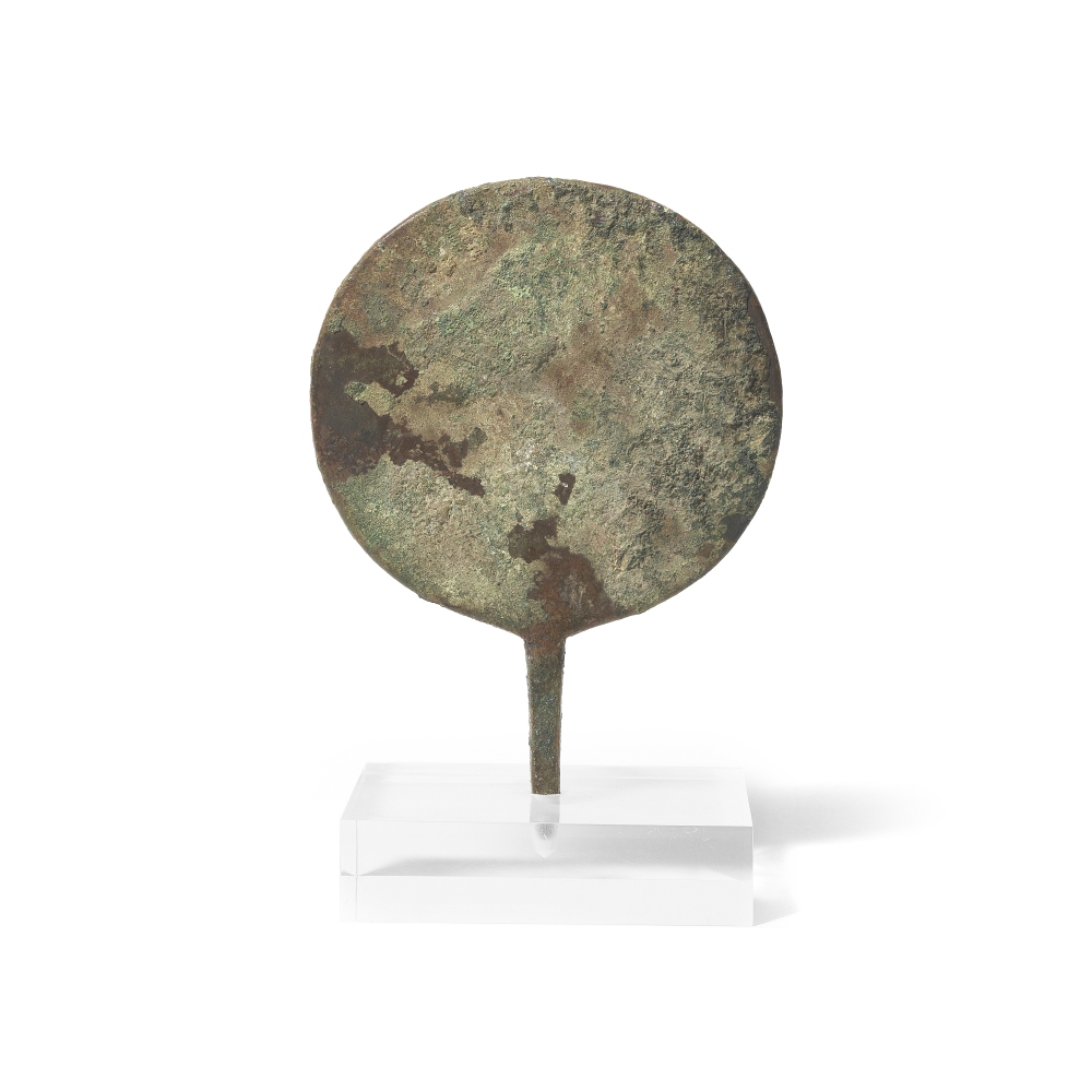 An Egyptian bronze mirror