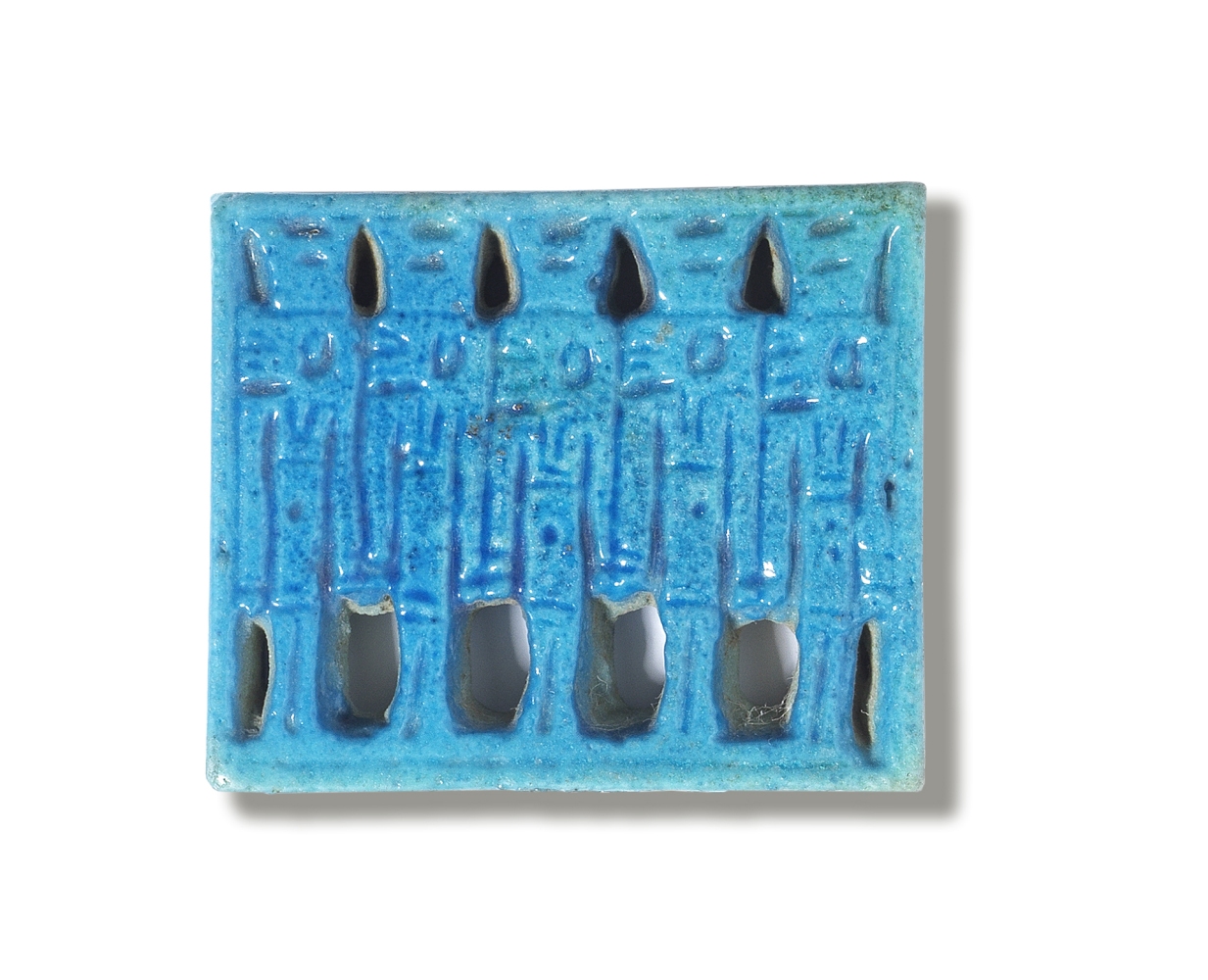 An Egyptian blue glazed faience openwork plaque