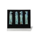 A set of four Egyptian turquoise glazed faience Four Sons of Horus