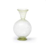 A Roman pale yellow-green glass footed flask