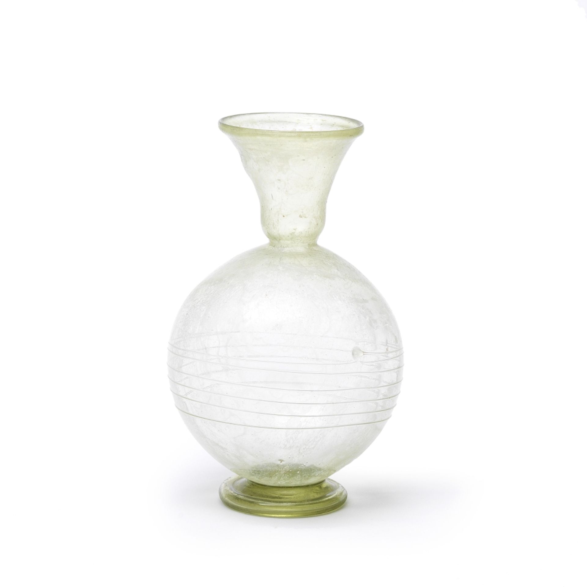 A Roman pale yellow-green glass footed flask