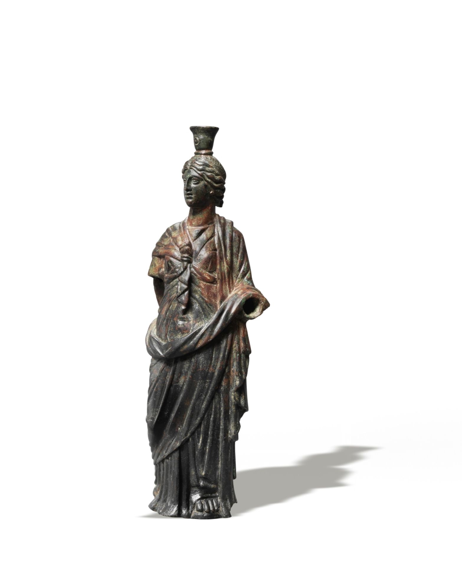 A Roman bronze figure of Isis-Fortuna