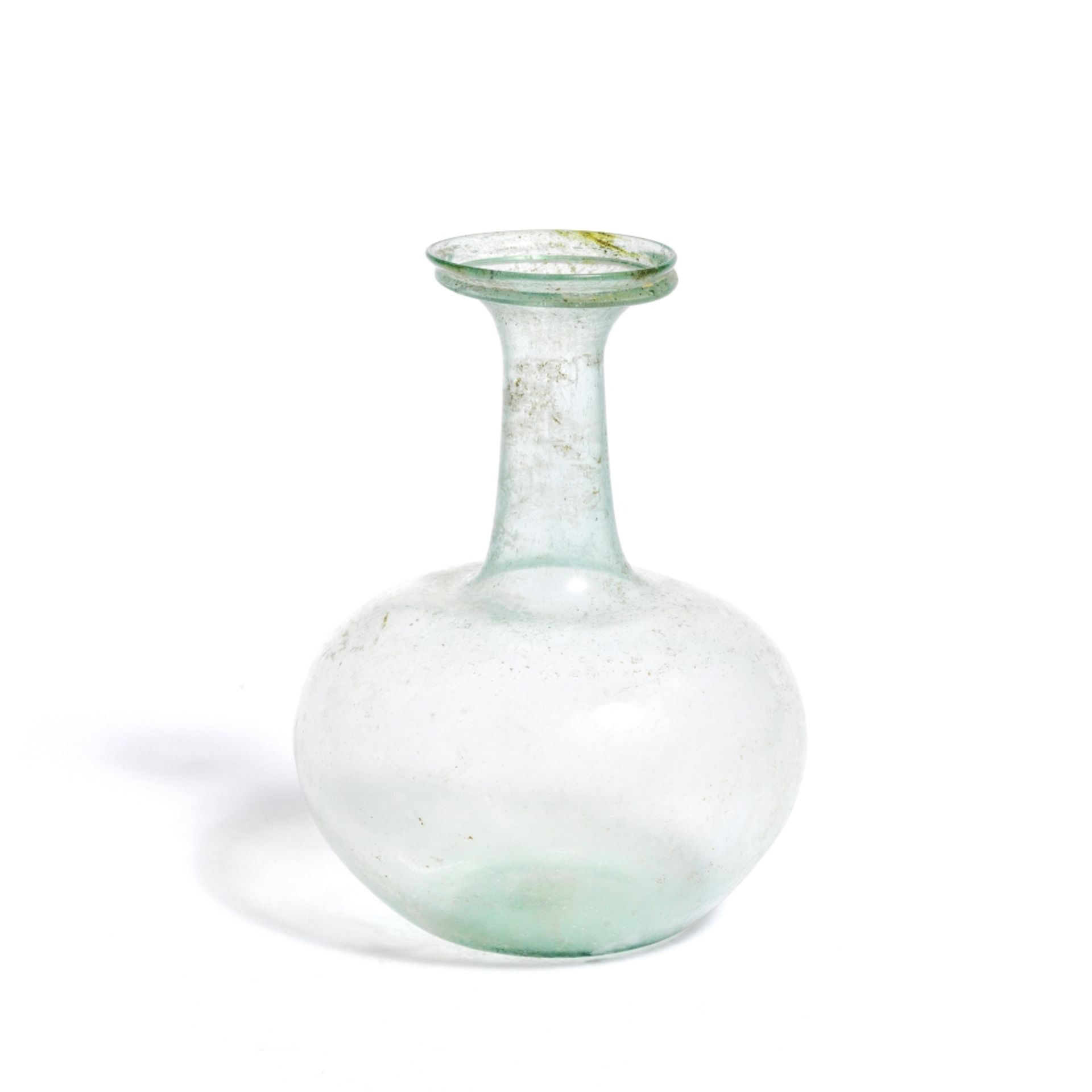 A Roman pale blue-green glass spherical flask