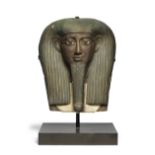 An Egyptian polychrome wood mummy mask