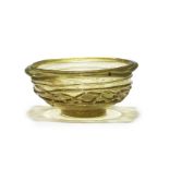 A Roman yellow-green glass shallow bowl