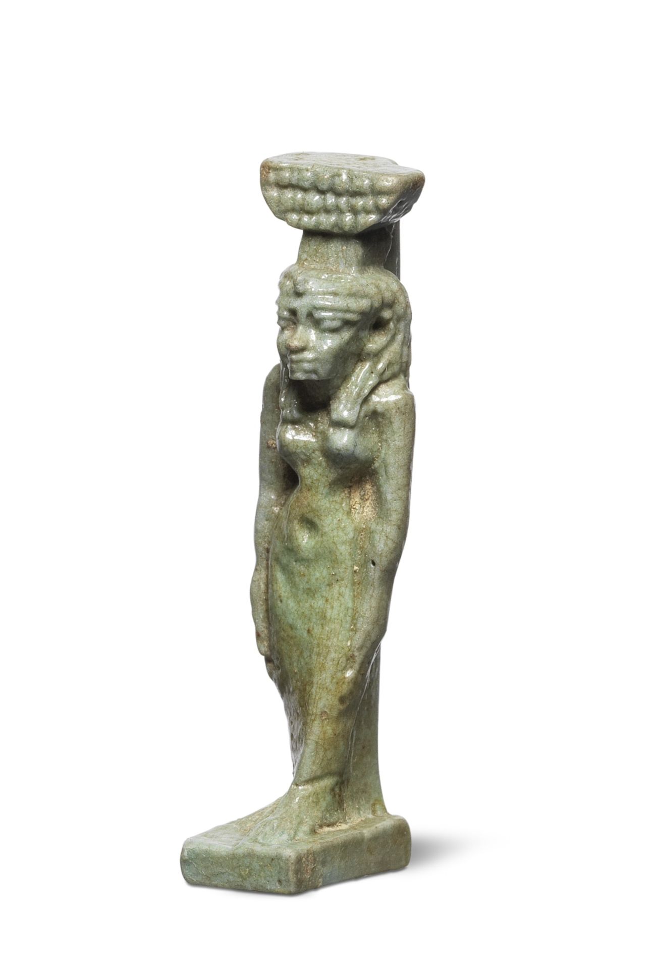 An Egyptian green glazed faience amulet of Nephthys