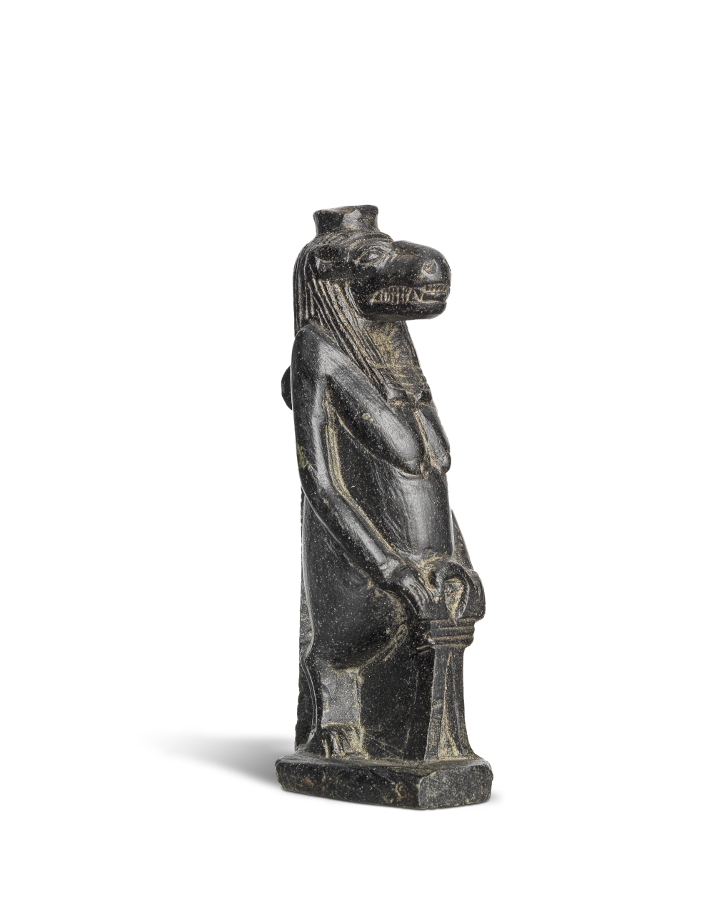 An Egyptian black steatite standing amulet of Taueret