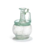 A Roman pale blue-green glass jug