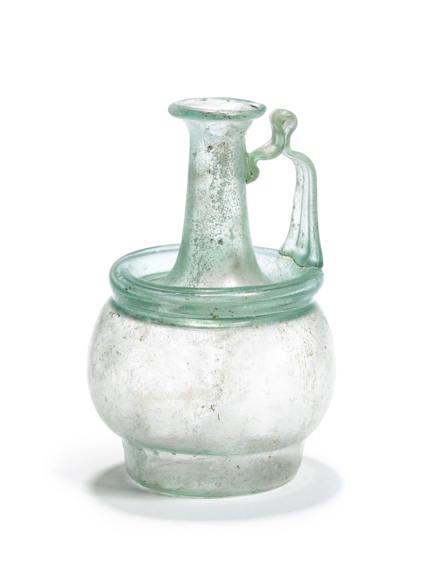 A Roman pale blue-green glass jug