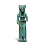 An Egyptian turquoise glazed faience amulet of a lion-headed goddess
