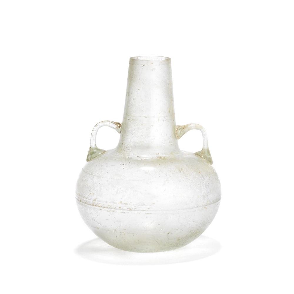 A Roman pale green glass bottle