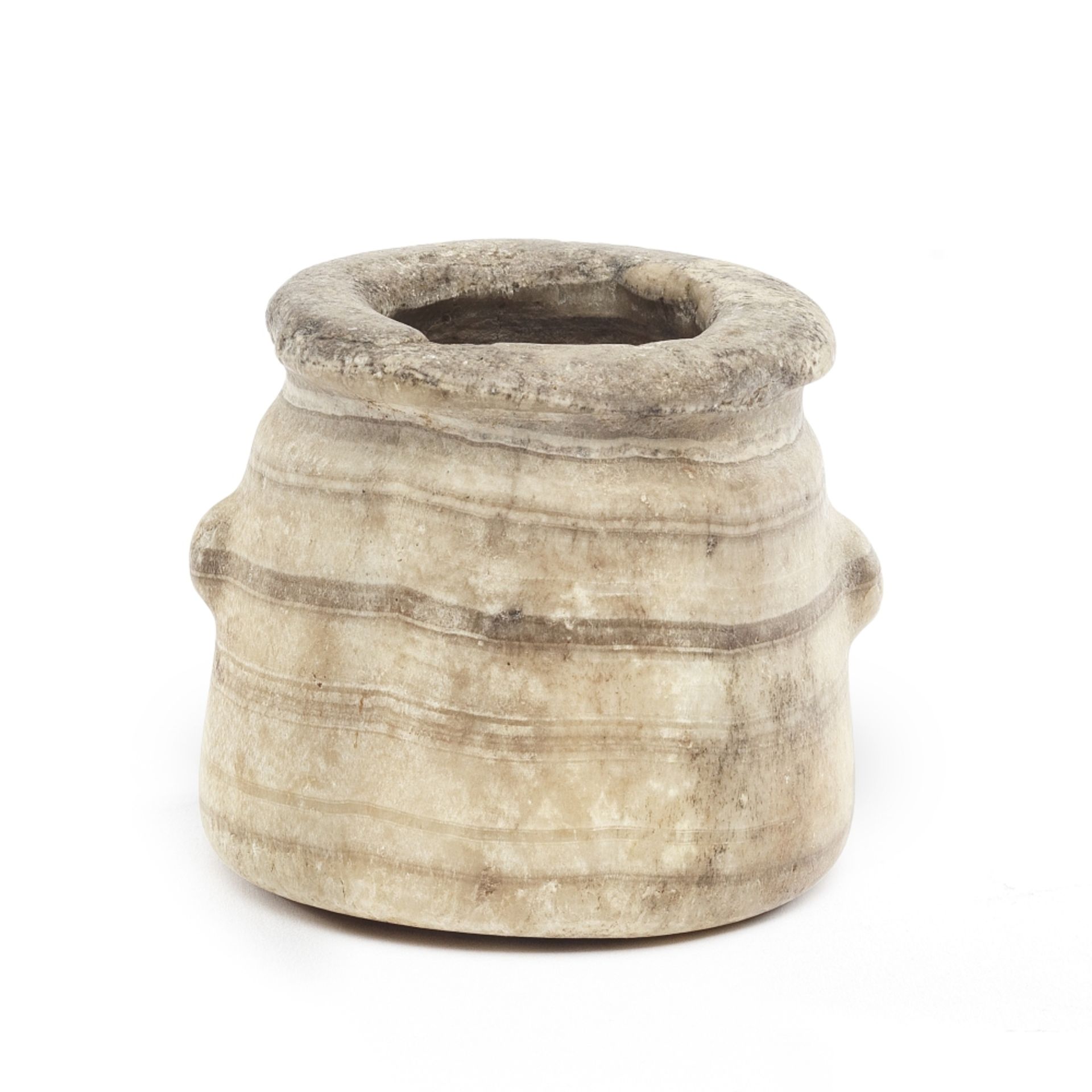 An Egyptian banded alabaster jar