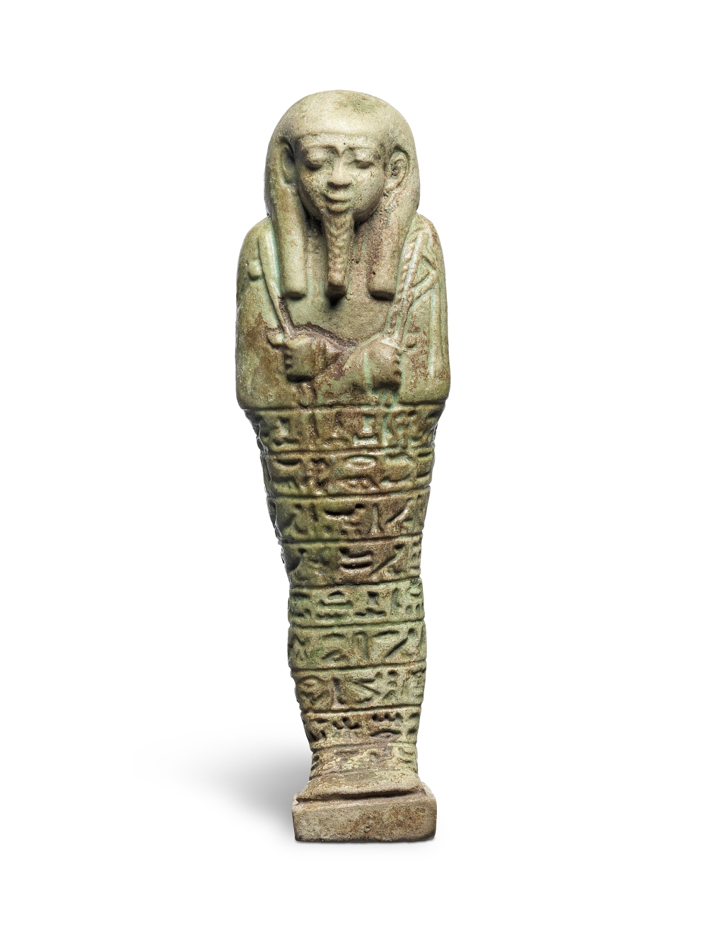 An Egyptian green glazed faience shabti for Ankh-Sma-Tawy